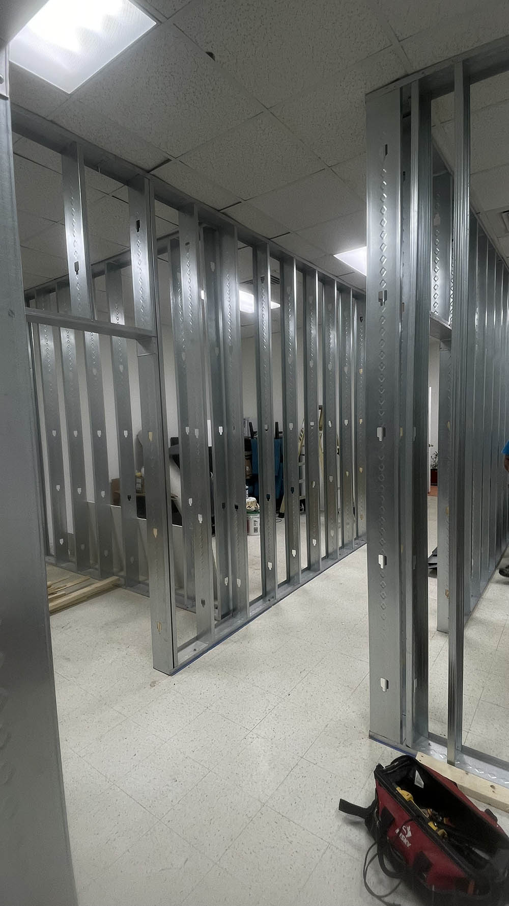 Metal stud framing with framed rough door openings